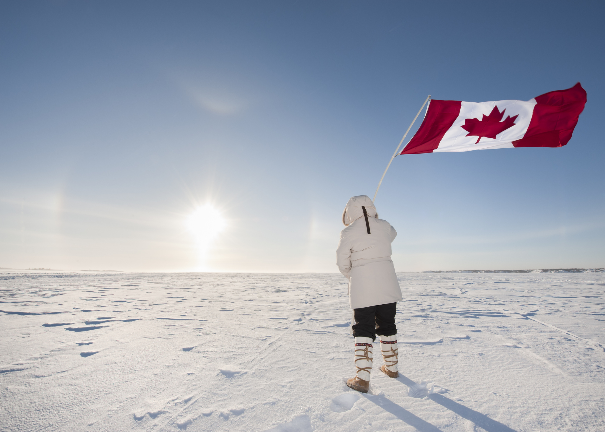 Arctic Sundog or Parhelion, Woman and Canadian Flag.
